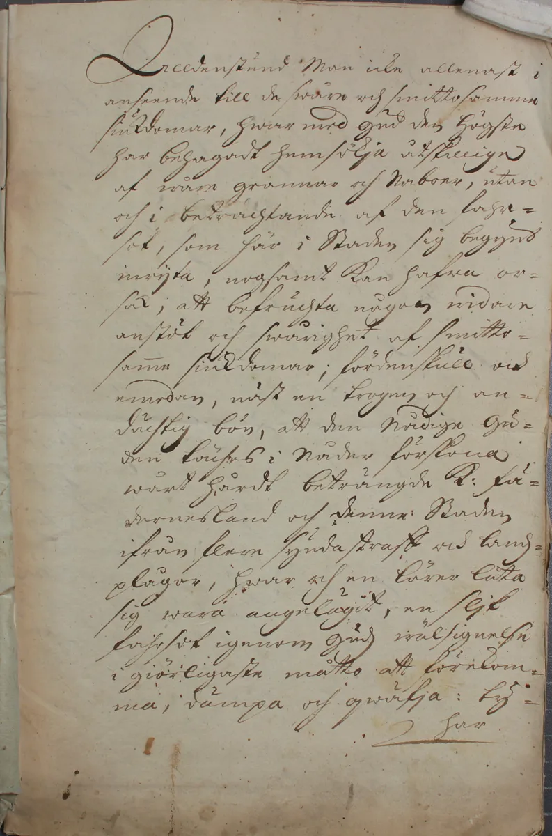 Página amarelada com manuscrito em tinta castanha, marcas no papel e margem inferior vazia.