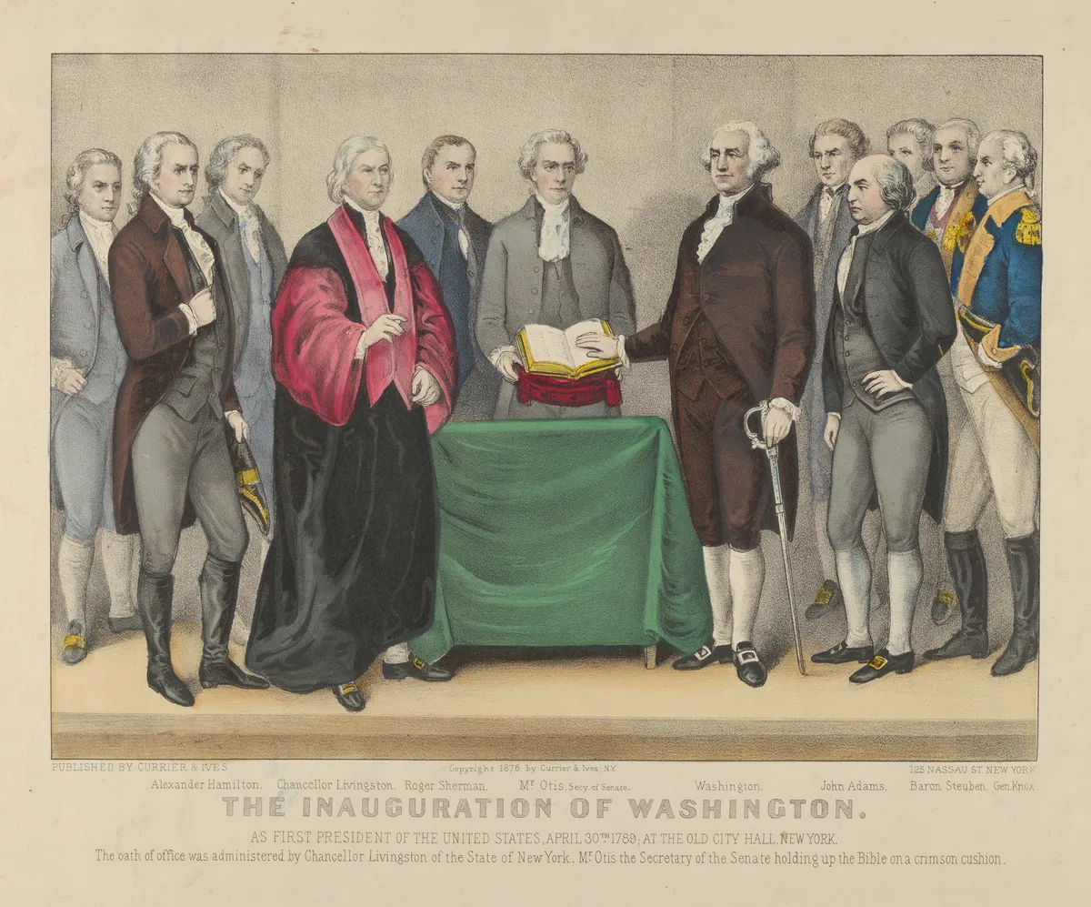 Litografia colorida de Washington diante de um livro aberto, entre homens de casaca, junto a uma mesa verde; título e nomes impressos abaixo.